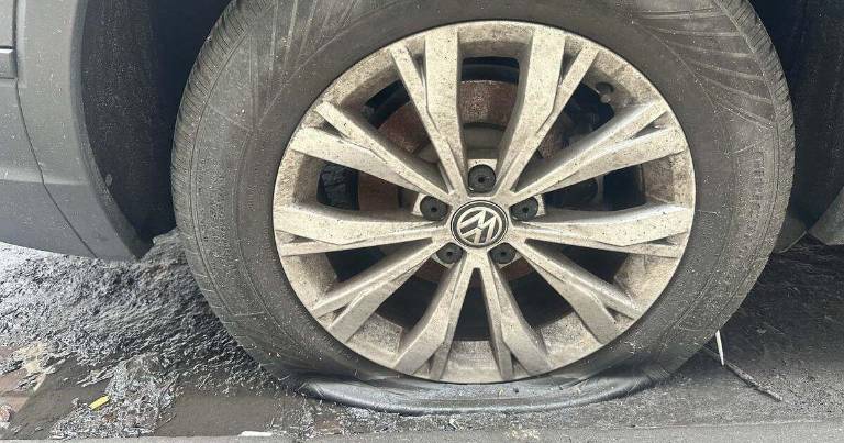 Slashed Volkswagen tire on a West 68th Street.