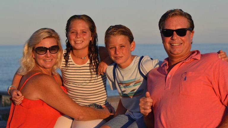 The Debbs family (from left) includes mom Merrill, their daughter Olivia who was a twin to Oakley (who died from anaphylactic shock in 2016) and dad Robert. They all channeled their anguish over the death of Oakley into a foundation Red Sneakers for Oakley, which will stage International Read Sneakers Day on May 20 to raise awareness of food allergies. Photo: Red Sneakers for Oakley