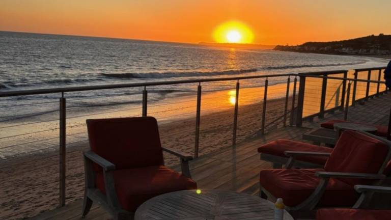 The view from Malibu Beach where the author spent happy days in her youth and now worries about her many friends as Los Angeles battles fires that have already consumed an area twice the size of Manhattan.