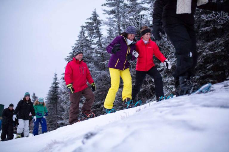 $!<b>Smuggs snowshoe tours offer something for everyone. Visitors can embark on a trek to see a mountain-top sunrise early in the morning, snowshoe to a brewery, or take a walk through the wilderness.</b>