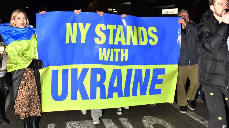 Pro-Ukrainian demonstrators march down Broadway on March 4.