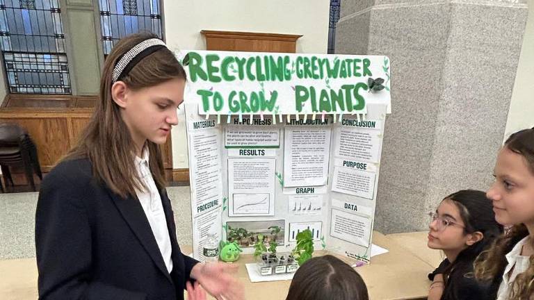 At the 6th-grade science fair.